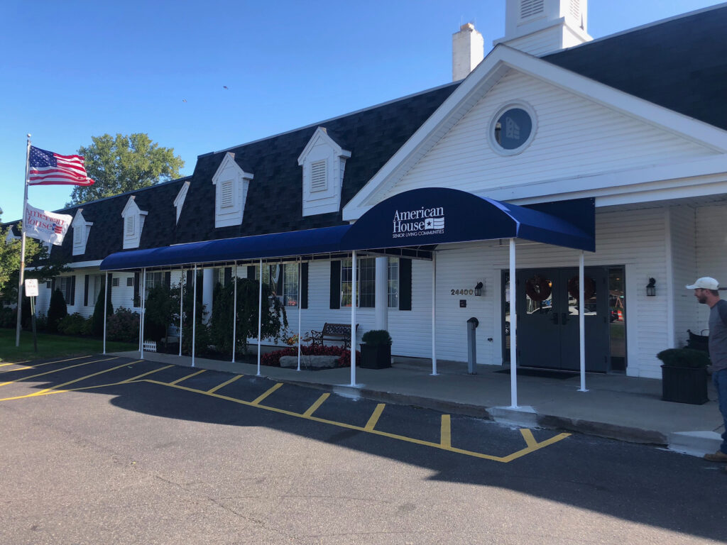 Awning signs for business - metal frame awning with canvas cover - American House Senior Living Communities - Marygrove Awnings