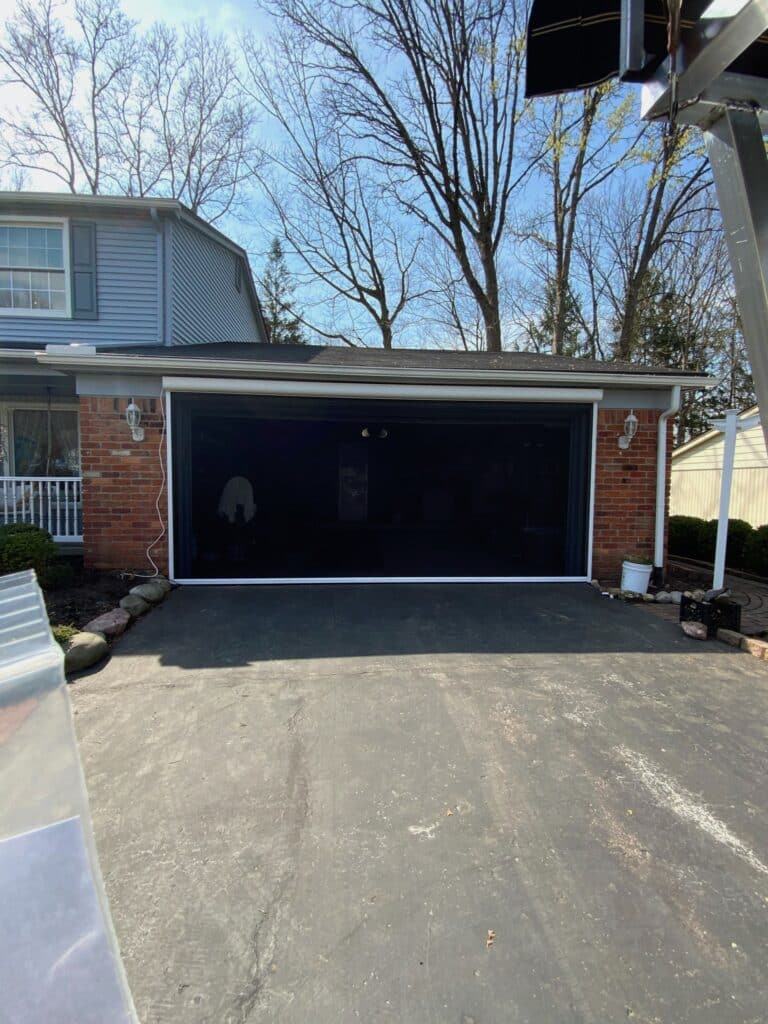 Screen in Garage Creating an Additional Room